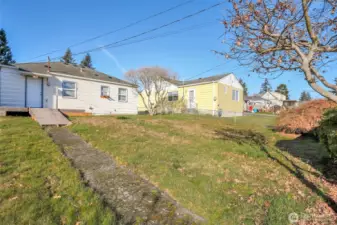 Open yard space with FUTURE POTENTIAL.