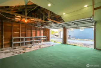 Covered area ideal for projects or additional storage.