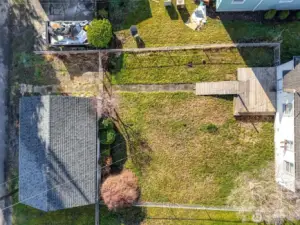 Bird’s-eye view showing depth of lot and backyard configuration.