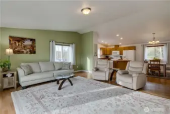 The spacious living room can accommodate various furniture arrangements.