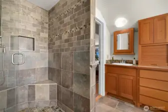Fully tiled walk in shower in the primary bath