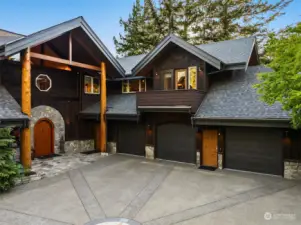 The home features 3 garage bays -- the right-most one can be closed off from the other two, as it has a separate entrance to the 2-bedroom Accessory Dwelling Unit built above.