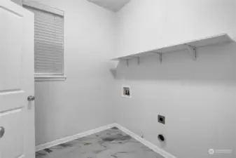 Large laundry room & half bath downstairs