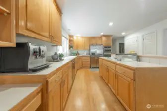 Large kitchen with cooking Island.  Plenty of cabinet and counterspace for storage and prep.