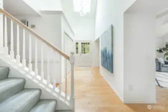 Large open foyer with double coat closet.