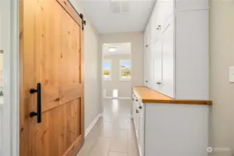 Pantry with storage cubby station