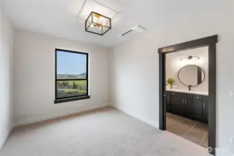 Upstairs guest bedroom with ensuite bathroom.