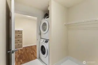 laundry room with an extra area to fold and hang. Cloths