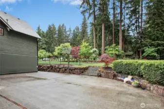Sport court area for wall ball, bball, playing, another firepit...