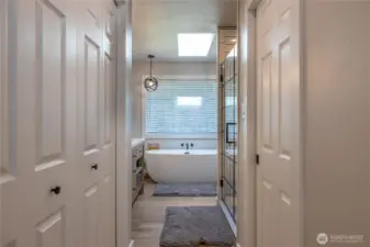 Enjoy the fully renovated primary bath with the free standing soaking tub.