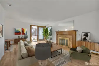 Living room leads to fully enclosed sun-porch.