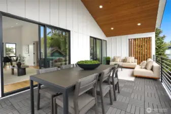 Upper Level Covered Deck off of Media Room and 2nd bedroom with Custom Metal Railings and Decking. Sweet territorial and Mt. Rainier Views