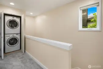 Washer and dryer are near upper bedrooms.