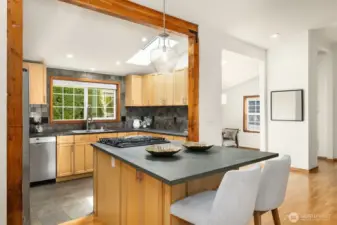 Entertain and gather in the open kitchen and center island. The hub of every home