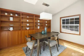 Dining room with cabinetry and shelving