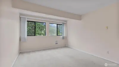 Only one home beyond the window makes this room feel private.