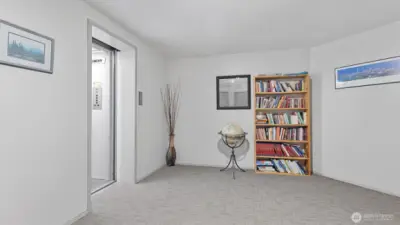 The book nook and the elevator on the 3rd floor