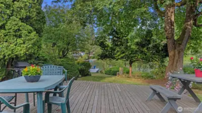 Views of the lake and dock from the courtyard entertainment deck.
