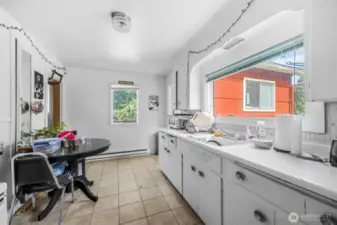 View of kitchen from the other side.  Fresh exterior paint on the house and the duplex at back of the property.