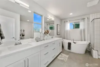 beautiful primary bath - views in between the mirrors
