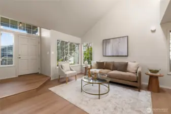 High ceilings and bright windows great you as you walk in the front door.