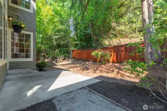 Refreshed fence and a yard ready for your personal touch.