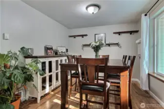 As you enter your home, to your right you will find your formal dining room with large window letting in all the light.