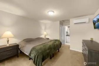 Spacious top floor primary suite complete with walk-in closet, sitting area and en-suite bath