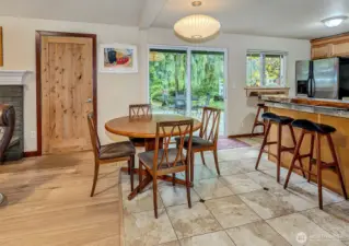 Tiled Dining Area. Left Door Leads To Large Utility Room.