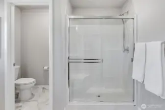 Primary ensuite with walk-in shower.