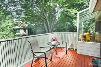 The upper deck has room for relaxing or grilling.