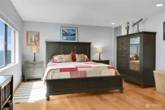 Master bedroom with king bed and partial sound view