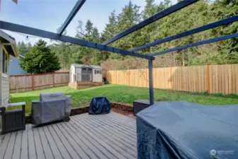 Backyard backs up to a greenbelt and the amazing shed stays!