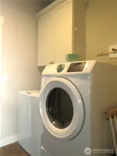 SEPARATE LAUNDRY LEADS TO THE TWO CAR GARAGE!