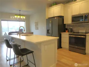 VIEW OF ISLAND SEATING TOWARD THE DINING ROOM!