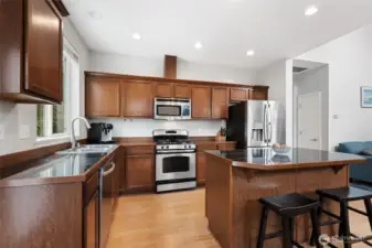 Another look at kitchen with Pantry behind door in hallway
