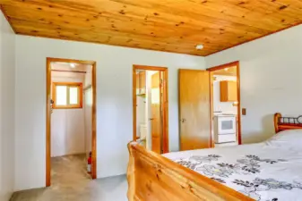 Southwest bedroom with 3/4 bath (right) and walk-in closet.