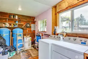 Laundry room and pressure tanks for all four structures.