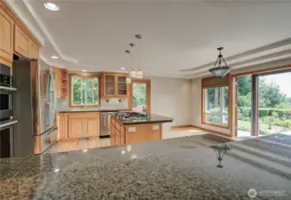 Open concept kitchen looks out onto the patio.