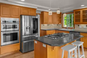 Welcome to your bright open kitchen with views of the mountains. New appliances, custom cabinets and an oversized pantry make this an enjoyable place to be.