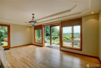 The dining room, beautiful views and refinished hardwood floors.