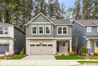 Wolf Points newest daylight basement plan the Cedar! Two car with electric vehicle charging. Photo's are for representational purposes only. Colors and finishes may differ.