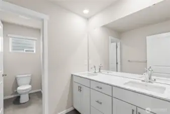 Main bath on 2nd floor with convenient separation.  Photo's are for representational purposes only. Colors and finishes may differ.