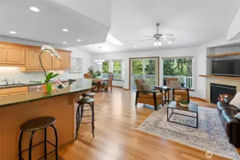 Wide open and spacious floor plan.  Living room propane fireplace, deck access, and plenty of natural light.