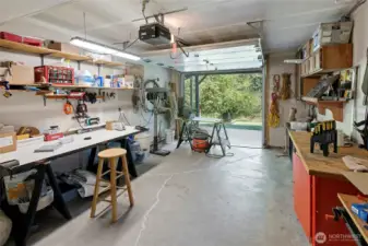 Insulated, drywalled, and heated garage bay/shop space.  A Turftile driveway from the main driveway gives easy access.