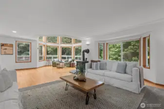 Solid oak floors with luxe carpet inlay add to the cutom home feel.