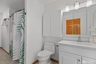 2nd bath that is large with full tub, vanity and floor to ceiling glass wall with give amazing light!