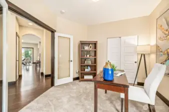 Good size office with French door and storage space.