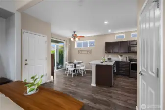 Modern kitchen with quartz countertops, stainless steel appliances, and a convenient eat-in space just off the kitchen.