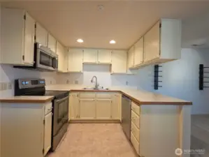 Well cared-for cabinets have been professionally repainted.